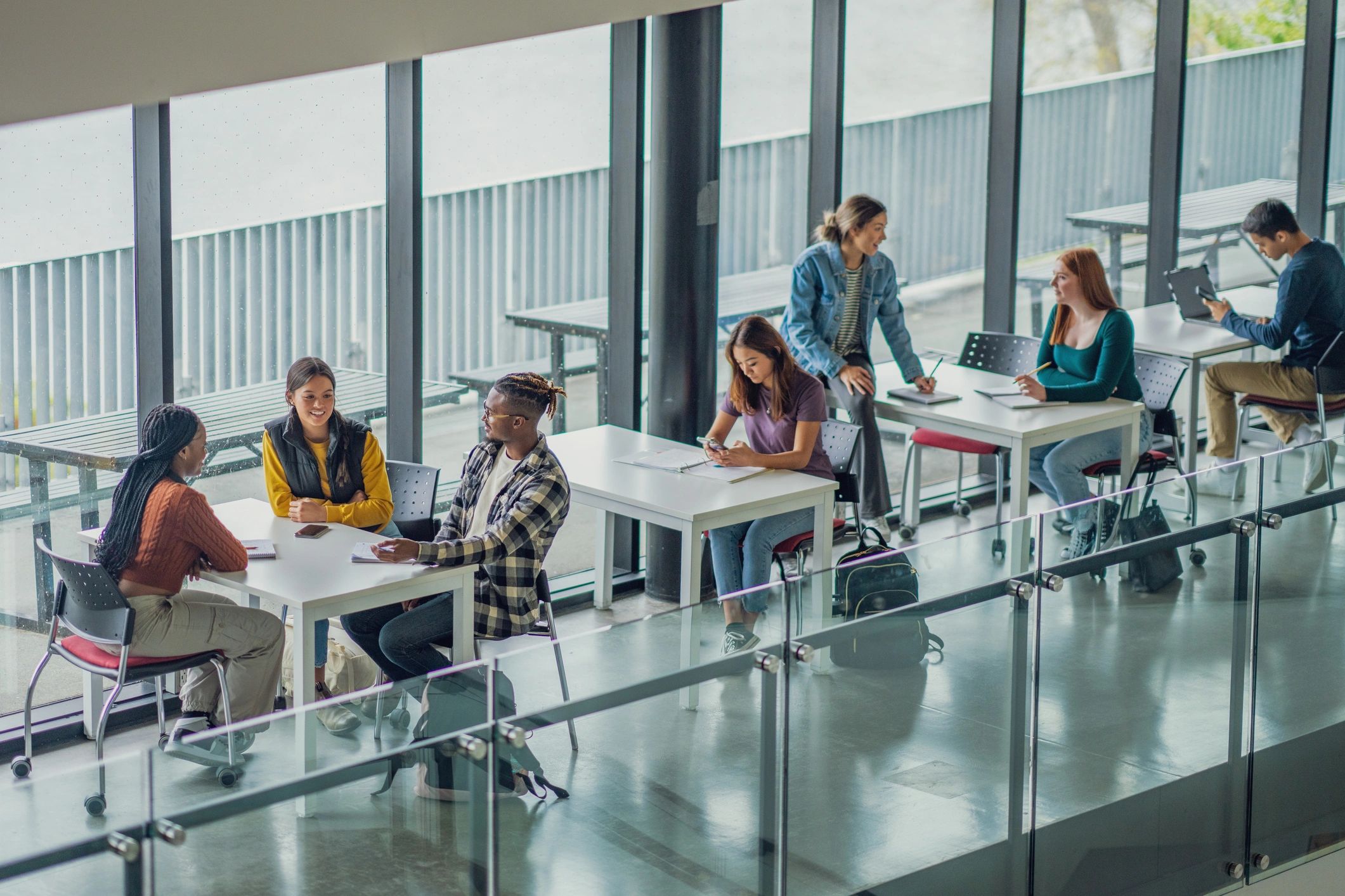 Students studying together in an open learning space